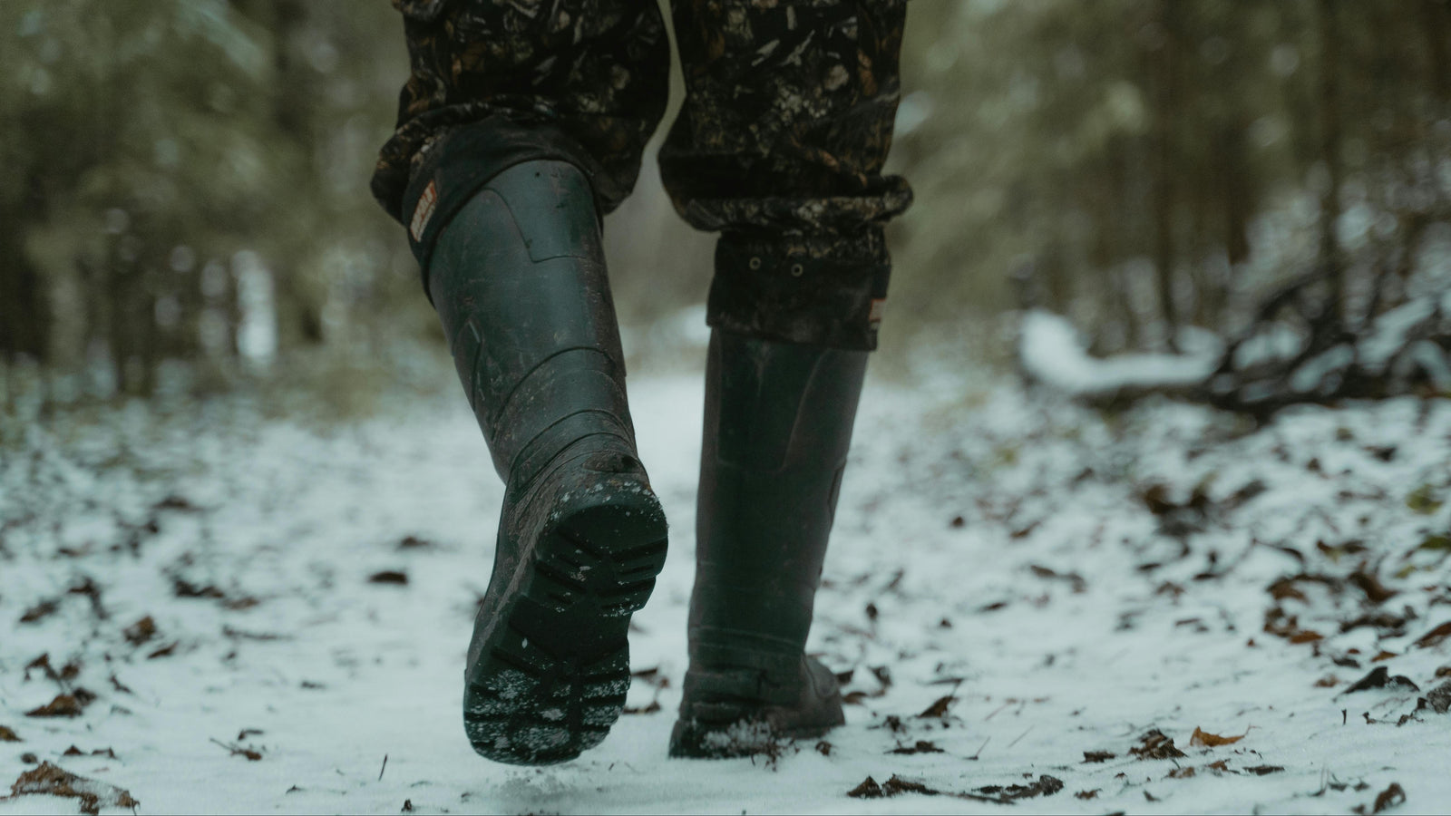 Person walking in snow with reusable foot warmers